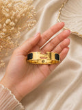Modern Gold Cuff Bracelet with Black Accents