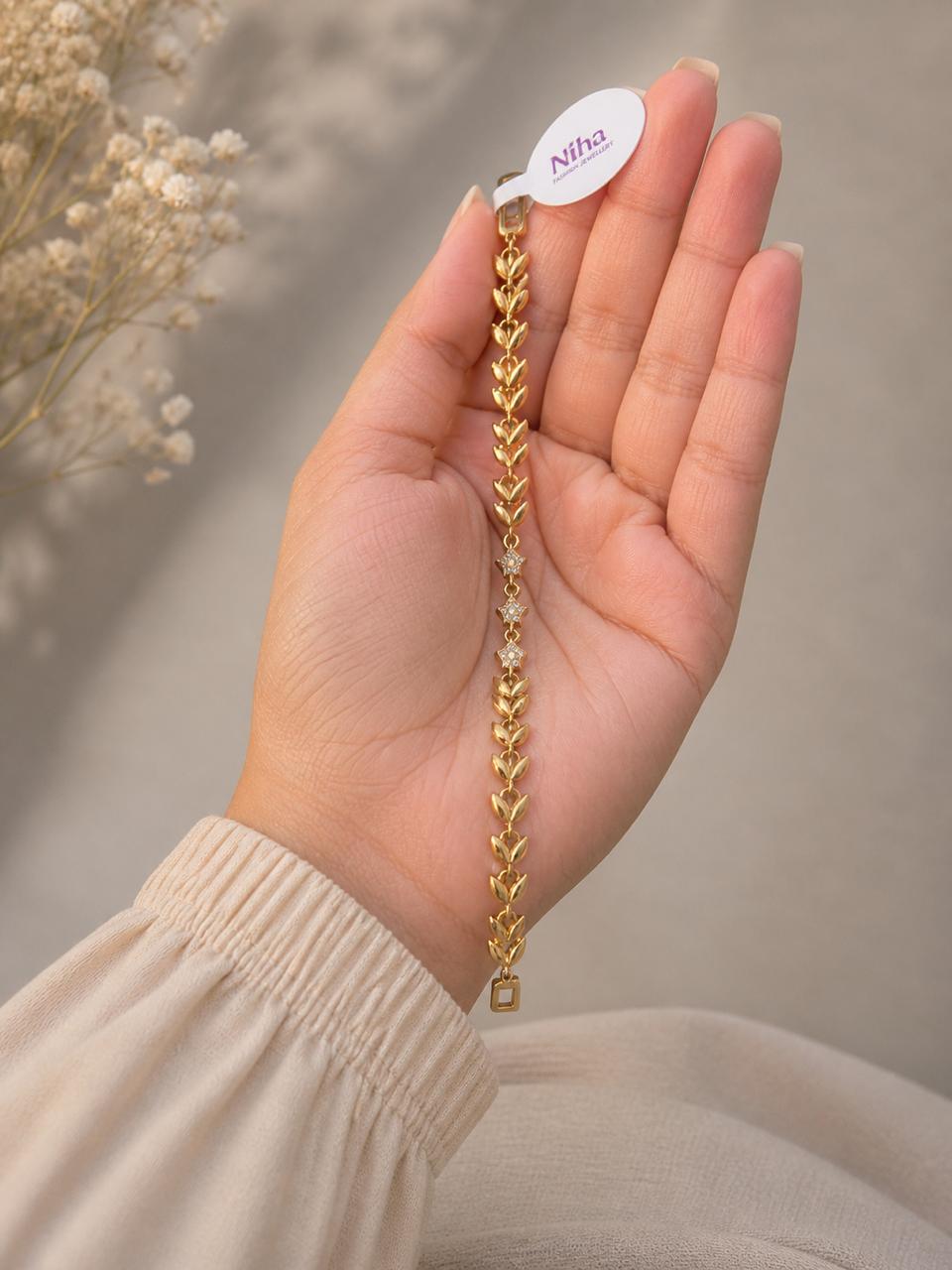 Elegant Gold Leaf Chain Bracelet with Sparkling Stone Accents