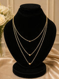 Elegant Triple Layer Gold Bead Necklace